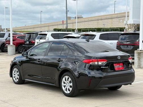Midnight Black Metallic 2024 Toyota Corolla Hybrid LE