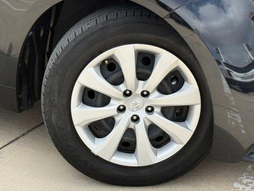 Midnight Black Metallic 2024 Toyota Corolla Hybrid LE