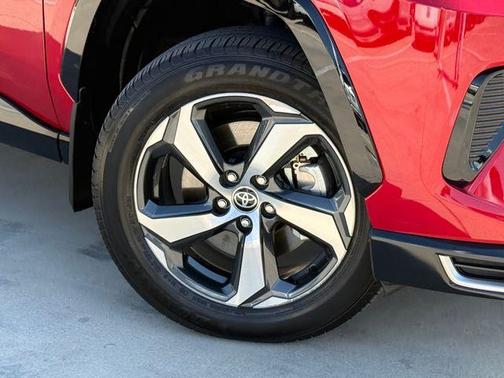 Red 2025 Toyota RAV4 Plug-In Hybrid SE