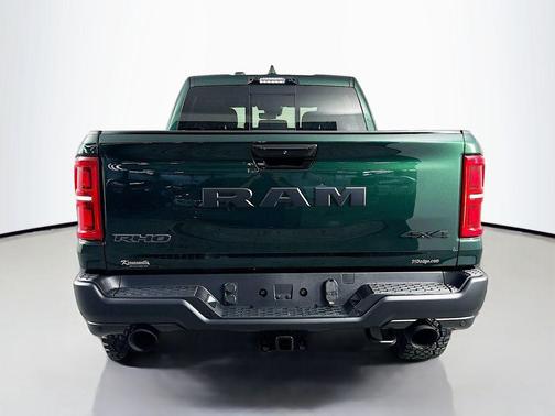 Serrano Green Metallic 2026 RAM 1500 RHO Crew Cab 4x4 5'7' Box