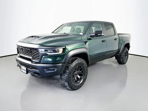 Serrano Green Metallic 2026 RAM 1500 RHO Crew Cab 4x4 5'7' Box