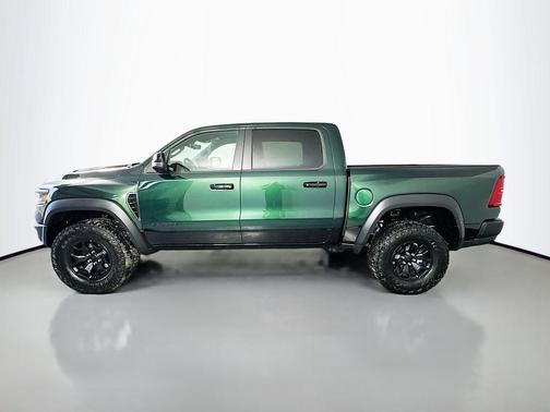 Serrano Green Metallic 2026 RAM 1500 RHO Crew Cab 4x4 5'7' Box