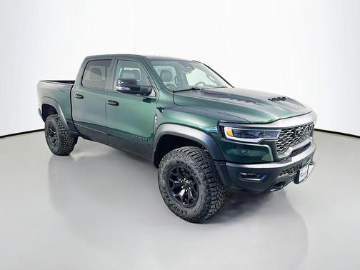 Serrano Green Metallic 2026 RAM 1500 RHO Crew Cab 4x4 5'7' Box