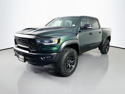 Serrano Green Metallic 2026 RAM 1500 RHO Crew Cab 4x4 5'7' Box