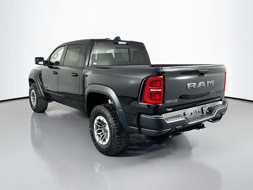 Diamond Black Crystal Pearlcoat 2026 RAM 1500 RHO Crew Cab 4x4 5'7' Box