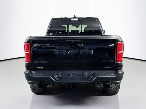 Diamond Black Crystal Pearlcoat 2026 RAM 1500 RHO Crew Cab 4x4 5'7' Box