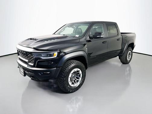 Diamond Black Crystal Pearlcoat 2026 RAM 1500 RHO Crew Cab 4x4 5'7' Box