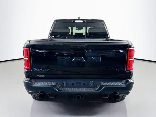 Diamond Black Crystal Pearlcoat 2026 RAM 1500 RHO Crew Cab 4x4 5'7' Box