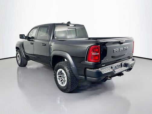 Diamond Black Crystal Pearlcoat 2026 RAM 1500 RHO Crew Cab 4x4 5'7' Box