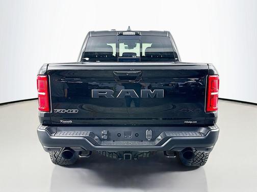 Diamond Black Crystal Pearlcoat 2026 RAM 1500 RHO Crew Cab 4x4 5'7' Box