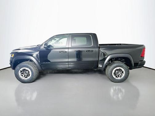 Diamond Black Crystal Pearlcoat 2026 RAM 1500 RHO Crew Cab 4x4 5'7' Box
