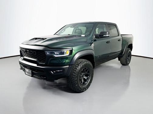 Serrano Green Metallic 2026 RAM 1500 RHO Crew Cab 4x4 5'7' Box