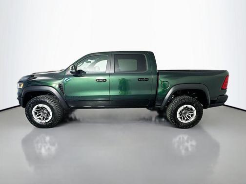 Serrano Green Metallic 2026 RAM 1500 RHO Crew Cab 4x4 5'7' Box