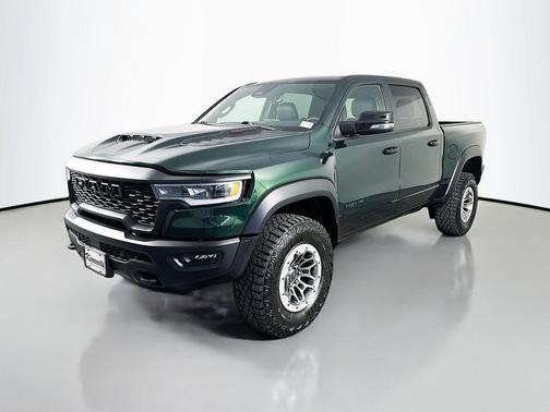 Serrano Green Metallic 2026 RAM 1500 RHO Crew Cab 4x4 5'7' Box
