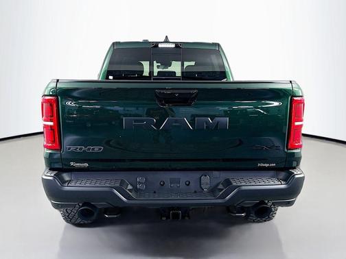 Serrano Green Metallic 2026 RAM 1500 RHO Crew Cab 4x4 5'7' Box