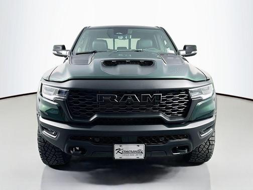 Serrano Green Metallic 2026 RAM 1500 RHO Crew Cab 4x4 5'7' Box