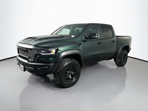 Serrano Green Metallic 2026 RAM 1500 RHO Crew Cab 4x4 5'7' Box
