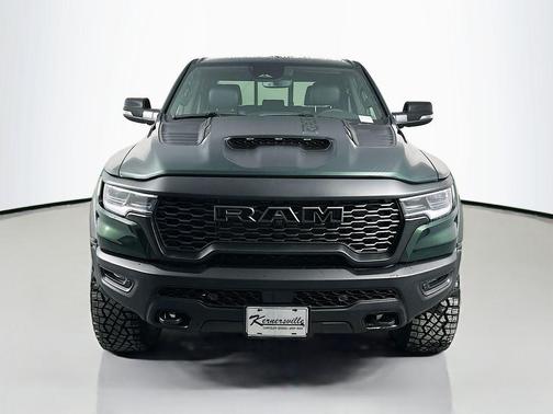 Serrano Green Metallic 2026 RAM 1500 RHO Crew Cab 4x4 5'7' Box