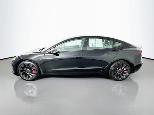 Solid Black 2023 Tesla Model 3 Performance