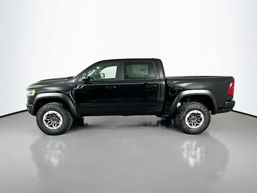 Diamond Black Crystal Pearlcoat 2026 RAM 1500 RHO Crew Cab 4x4 5'7' Box