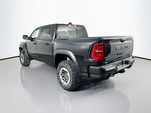 Diamond Black Crystal Pearlcoat 2026 RAM 1500 RHO Crew Cab 4x4 5'7' Box