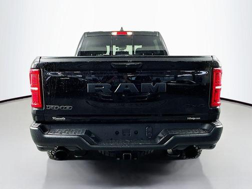 Diamond Black Crystal Pearlcoat 2026 RAM 1500 RHO Crew Cab 4x4 5'7' Box