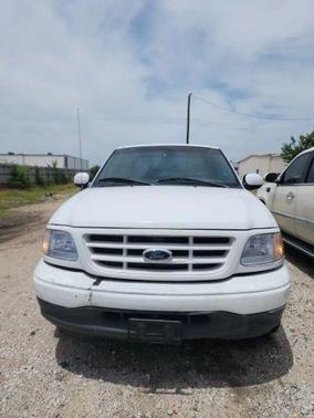 White 2000 Ford F-150 SuperCab