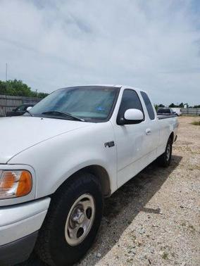 White 2000 Ford F-150 SuperCab