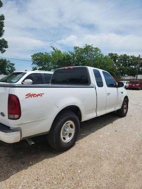 White 2000 Ford F-150 SuperCab