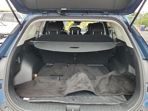 Dark Green 2023 Kia Sportage Hybrid EX