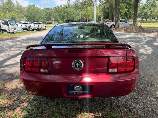 Red 2006 Ford Mustang Deluxe