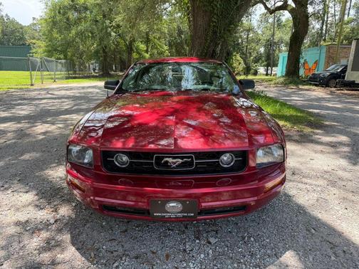 Red 2006 Ford Mustang Deluxe
