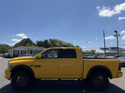Yellow 2016 RAM 1500 Sport