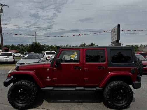Burgundy 2011 Jeep Wrangler Unlimited Sahara
