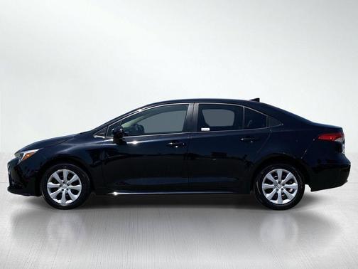 Midnight Black Metallic 2025 Toyota Corolla Hybrid LE