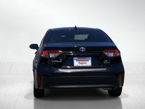 Midnight Black Metallic 2025 Toyota Corolla Hybrid LE