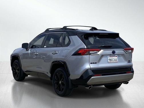 Silver Sky Metallic/Midnight Black Metallic 2024 Toyota RAV4 Hybrid SE