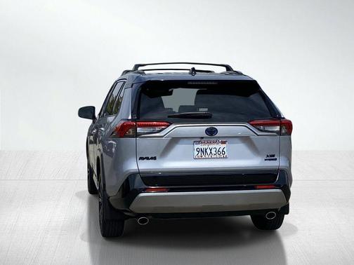 Silver Sky Metallic/Midnight Black Metallic 2024 Toyota RAV4 Hybrid SE