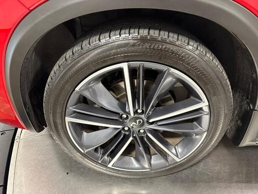 Dynamic Sunstone Red 2023 INFINITI QX55 ESSENTIAL