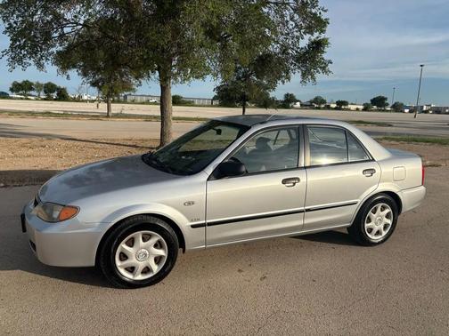 Sunlight Silver Metallic 2003 Mazda Protege DX