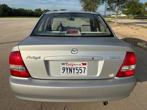 Sunlight Silver Metallic 2003 Mazda Protege DX