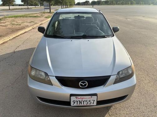 Sunlight Silver Metallic 2003 Mazda Protege DX
