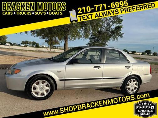 Sunlight Silver Metallic 2003 Mazda Protege DX