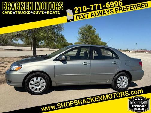 Sandrift Metallic 2003 Toyota Corolla LE