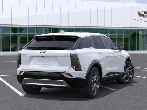 Vibrant White Tricoat 2026 Cadillac OPTIQ Luxury