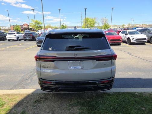 Stone Metallic 2026 Buick Enclave Sport Touring