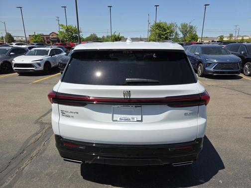 Iridescent White Tricoat 2026 Buick Enclave Sport Touring