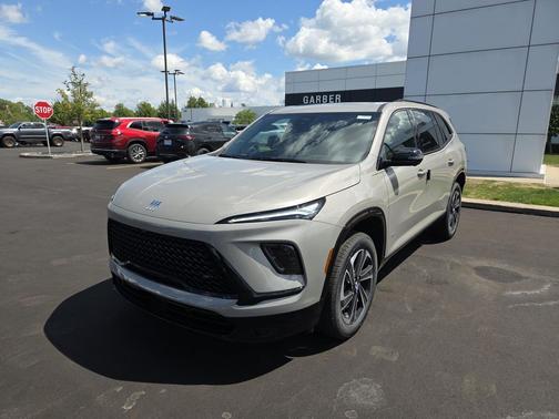 Stone Metallic 2026 Buick Enclave Sport Touring
