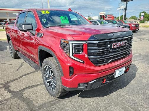 Volcanic Red Tintcoat 2026 GMC Sierra 1500 AT4