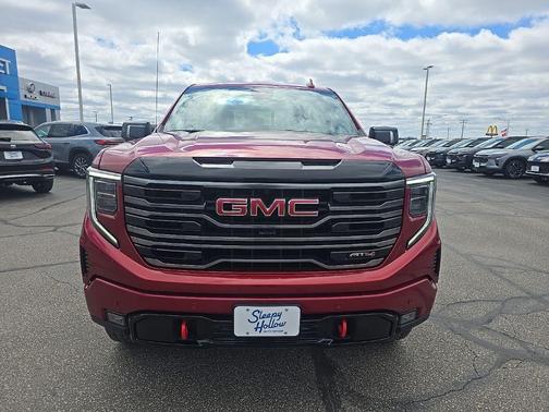 Volcanic Red Tintcoat 2026 GMC Sierra 1500 AT4